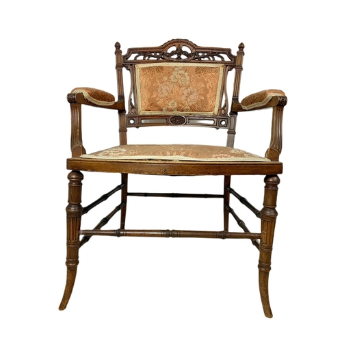 844 - Late Victorian carved walnut parlour armchair. 54x45x77cm