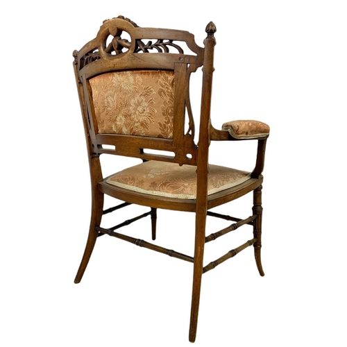 844 - Late Victorian carved walnut parlour armchair. 54x45x77cm