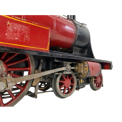 85 - Live Steam 3 1/2 inch Gauge 4-4-0 Locomotive And Tender train and carriage. Total length 103cm.