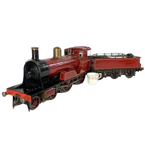 85 - Live Steam 3 1/2 inch Gauge 4-4-0 Locomotive And Tender train and carriage. Total length 103cm.