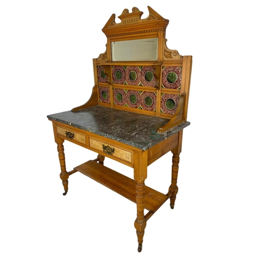 851 - Late Victorian satin walnut and burr ash marble top washstand with tile gallery back. 97.5x53x152cm