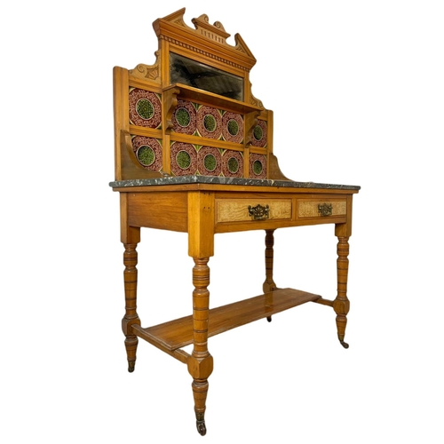 851 - Late Victorian satin walnut and burr ash marble top washstand with tile gallery back. 97.5x53x152cm