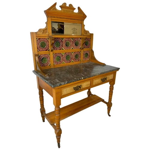 851 - Late Victorian satin walnut and burr ash marble top washstand with tile gallery back. 97.5x53x152cm