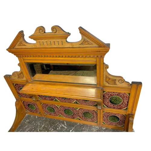 851 - Late Victorian satin walnut and burr ash marble top washstand with tile gallery back. 97.5x53x152cm