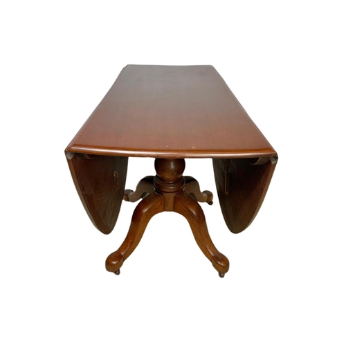 854 - Victorian mahogany drop leaf dining table. Extended 154x97x72.5cm