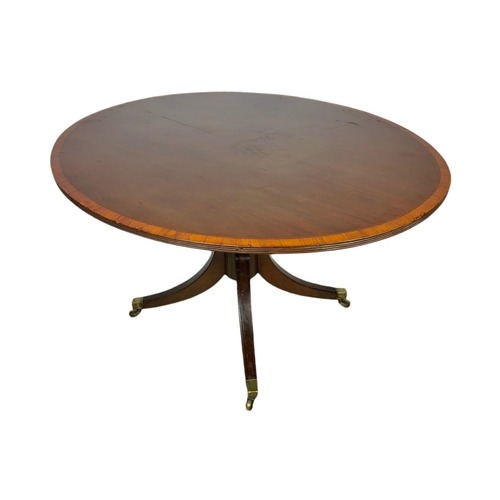 865 - Georgian inlaid tilt top pedestal dining table. 116.5x102x71cm