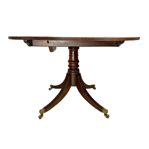 865 - Georgian inlaid tilt top pedestal dining table. 116.5x102x71cm