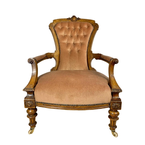 870 - Victorian carved walnut gents parlour armchair. 63x74x98cm