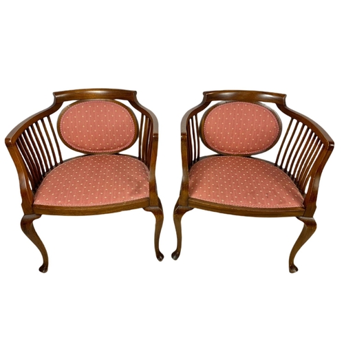 874 - Pair of Edwardian mahogany tub armchairs.