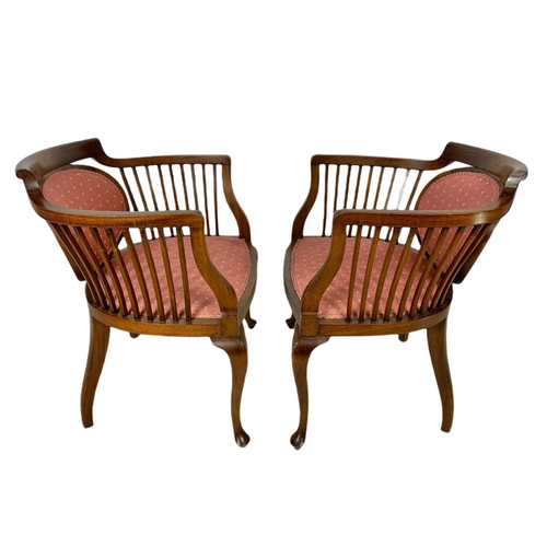 874 - Pair of Edwardian mahogany tub armchairs.