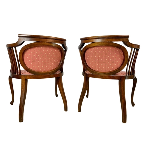 874 - Pair of Edwardian mahogany tub armchairs.