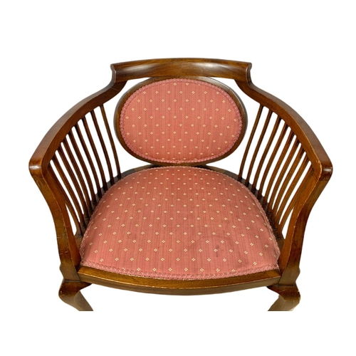 874 - Pair of Edwardian mahogany tub armchairs.