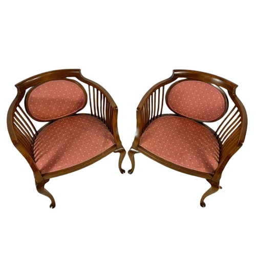 874 - Pair of Edwardian mahogany tub armchairs.