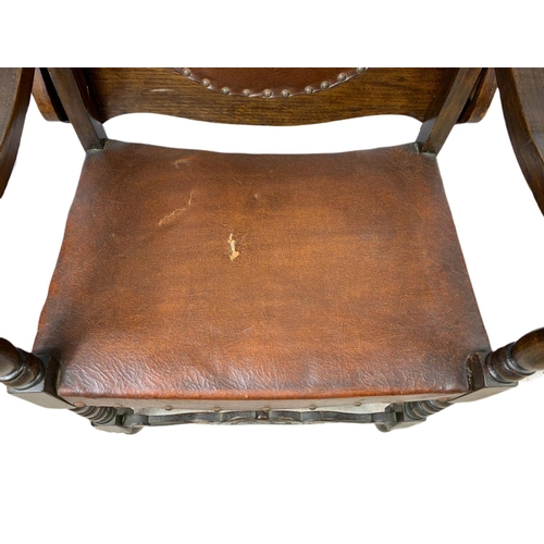 879 - Edwardian oak combination hall chair table with leather seat