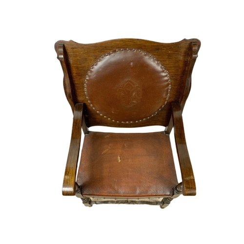 879 - Edwardian oak combination hall chair table with leather seat