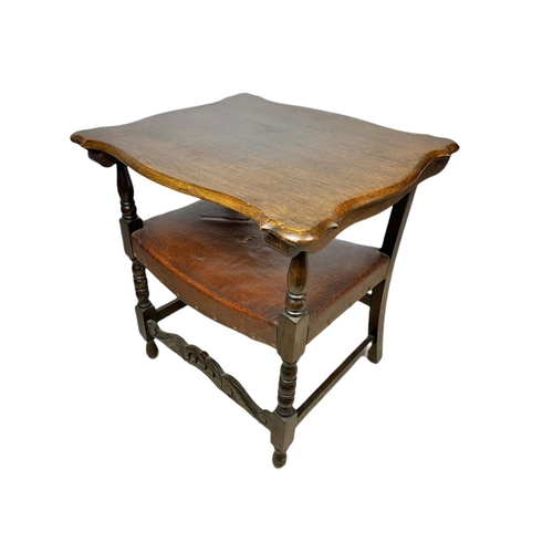 879 - Edwardian oak combination hall chair table with leather seat