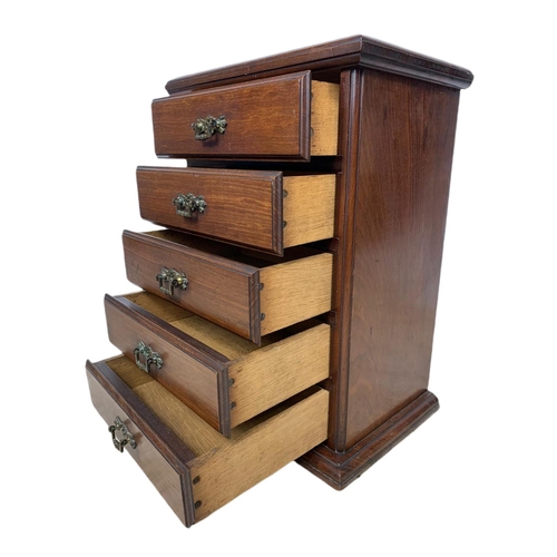 885 - Edwardian miniature chest of drawers. 38x26x50.5cm