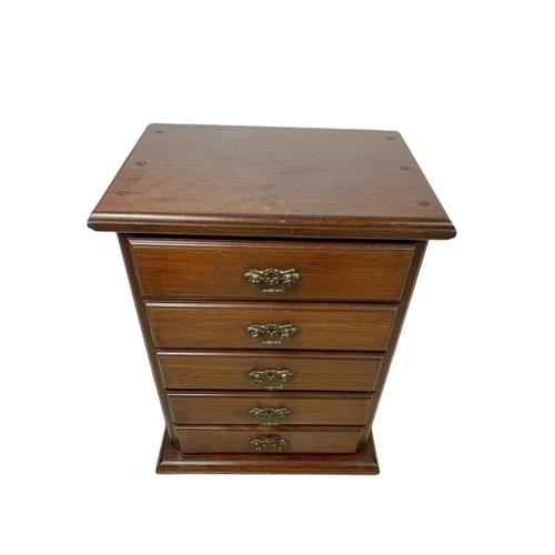 885 - Edwardian miniature chest of drawers. 38x26x50.5cm