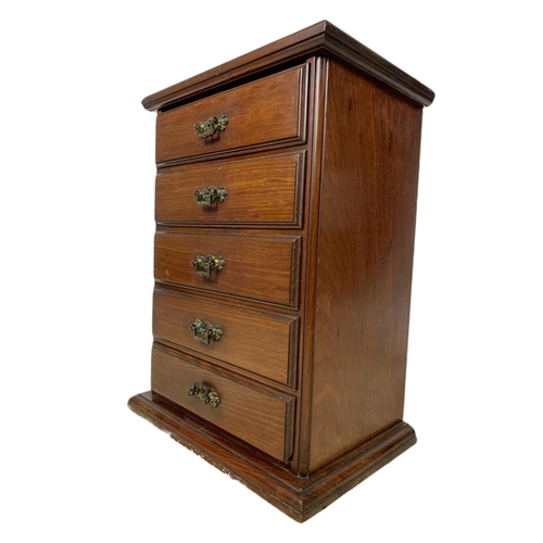 885 - Edwardian miniature chest of drawers. 38x26x50.5cm