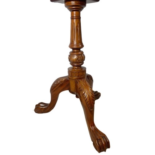 889 - Near pair of carved mahogany snap top pedestal side tables. Height of both 70cm and 66cm