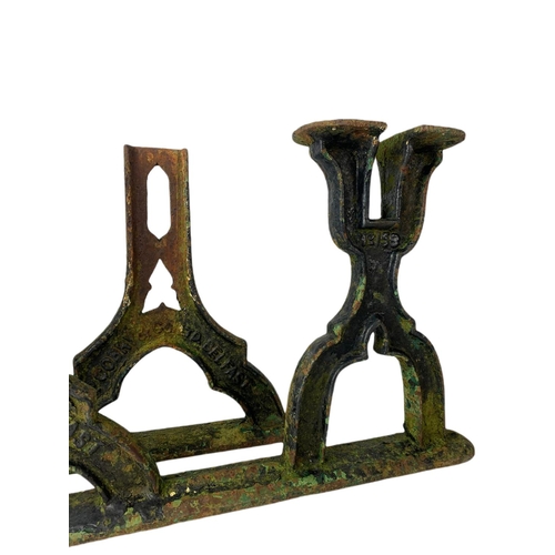 89 - Pair of late 19th century J.P. Corry cast iron railway bench ends. 67/36cm