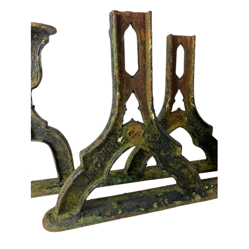 89 - Pair of late 19th century J.P. Corry cast iron railway bench ends. 67/36cm