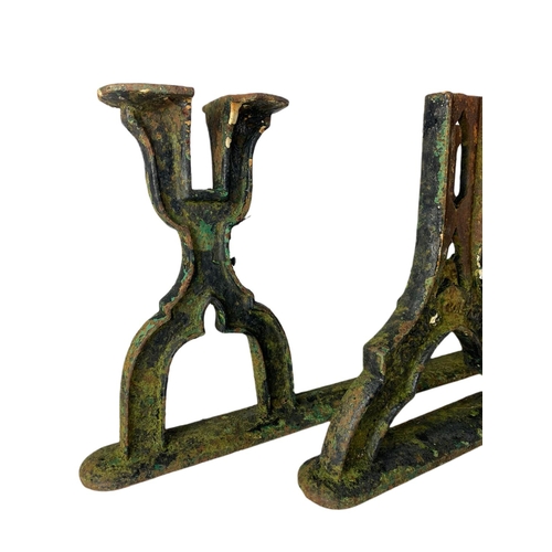 89 - Pair of late 19th century J.P. Corry cast iron railway bench ends. 67/36cm