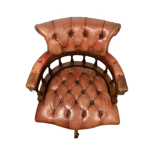 893 - Vintage good quality leather swivel captains chair