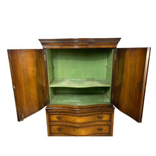 907 - Large 1930’s Georgian style serpentine walnut chest on chest tallboy. 83x44x153cm