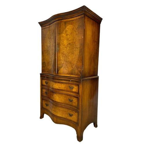 907 - Large 1930’s Georgian style serpentine walnut chest on chest tallboy. 83x44x153cm