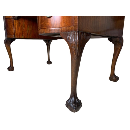 919 - 1930’s Chippendale style mahogany leather top desk with ball and claw feet. 106.5x65x77cm