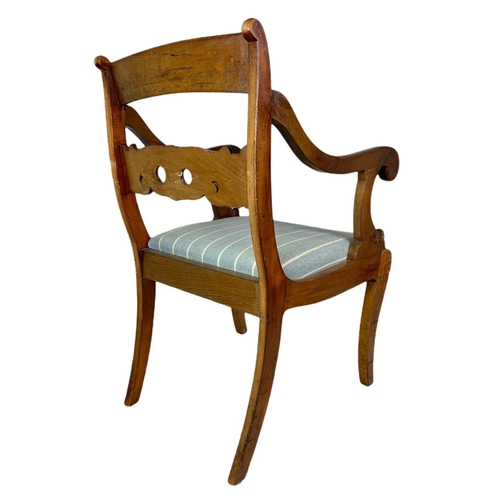 922 - 19th century mahogany continental sabre leg armchair.