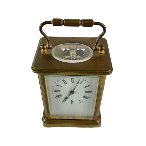 93 - Late 19th century French carriage clock with unusual winding mechanism 8/6.5/14/5cm