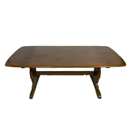 930 - Large Ercol mid century dining table. 182x81x73cm