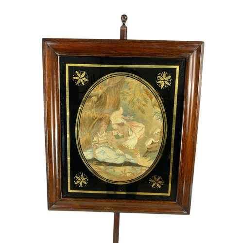 945 - William IV carved mahogany pole screen with silk picture. 146cm.