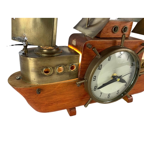 96 - 1950’s vintage combination lamp clock. 41x43cm