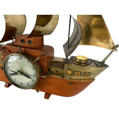 96 - 1950’s vintage combination lamp clock. 41x43cm