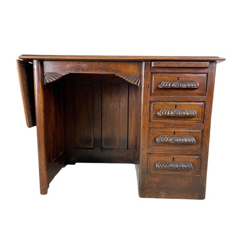 1015 - Edwardian oak drop leaf writing desk. Circa 1910 Extended 120x45.5x67cm