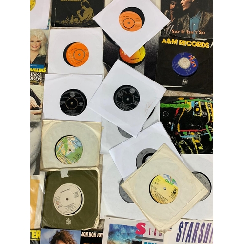 260 - Quantity of 45’s/singles records. Including Jon Bon Jovi, several Fleetwood Macs, several Elvis, sev... 