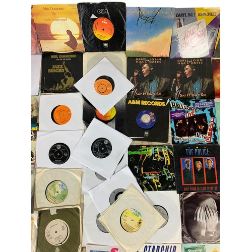 260 - Quantity of 45’s/singles records. Including Jon Bon Jovi, several Fleetwood Macs, several Elvis, sev... 