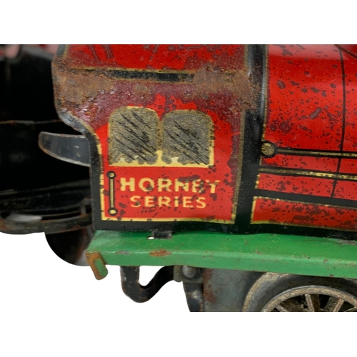 280 - Early 20th century Meccano tinplate wind up trains with tracks. Horney Series Hornby