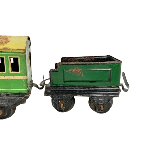 280 - Early 20th century Meccano tinplate wind up trains with tracks. Horney Series Hornby