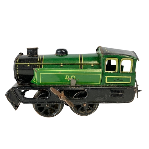 280 - Early 20th century Meccano tinplate wind up trains with tracks. Horney Series Hornby