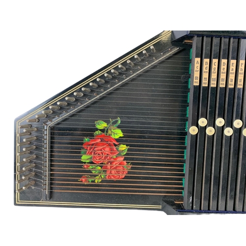 281 - Early 20th century autoharp. Made in Germany. 31x51cm