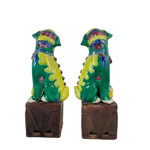 453 - Pair of vintage Chinese porcelain Foo Dogs. 26cm