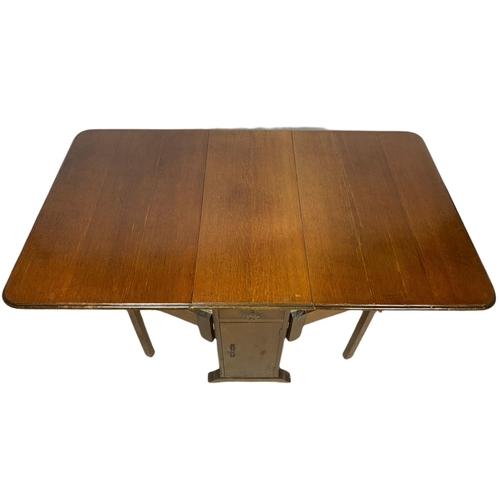 796 - Vintage 1950’s oak drop leaf dining table. Extended 151cm