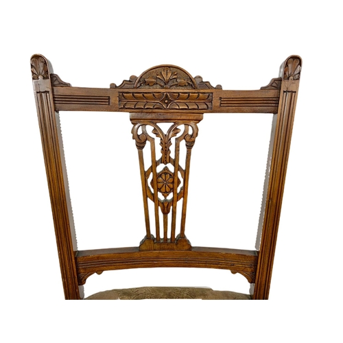 931 - Late Victorian carved walnut ladies side chair.