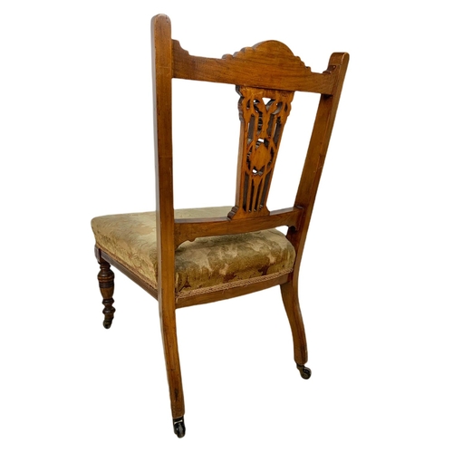 931 - Late Victorian carved walnut ladies side chair.