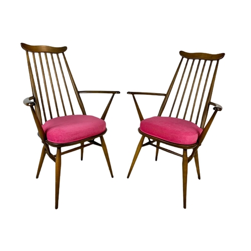 933 - Pair of Ercol elm mid century armchairs.