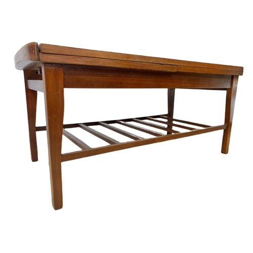 935 - Teak mid century coffee table with sliding trays. 96x46x44cm